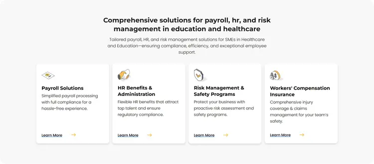 Sección de la home en desktop con el titular "Comprehensive solutions for payroll, hr, and risk management in education and healthcare" y cuatro tarjetas blancas con icono, título, una frase y el enlace "Learn More".
